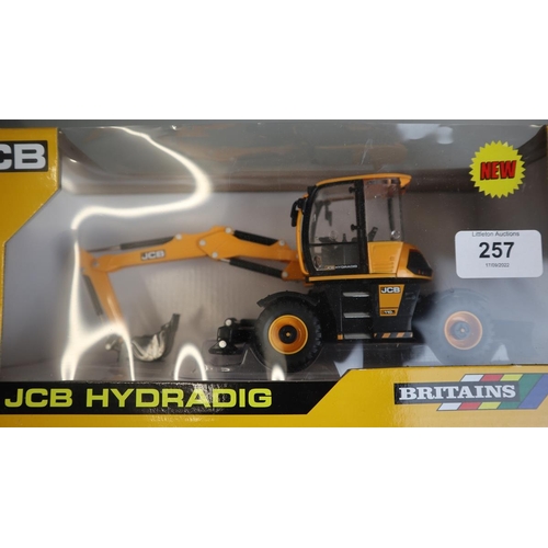 257 - 2 die cast excavators and die cast bull dozer