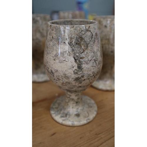 276 - Four marble goblets together with large tankard