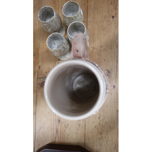 276 - Four marble goblets together with large tankard