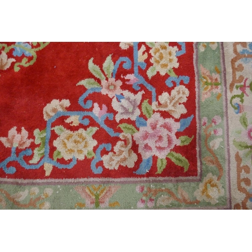 378 - Large red patterned rug - Approx size: 276cm x 390cm