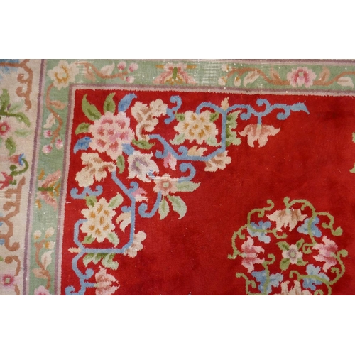 378 - Large red patterned rug - Approx size: 276cm x 390cm