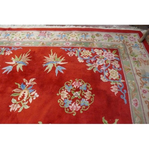 378 - Large red patterned rug - Approx size: 276cm x 390cm