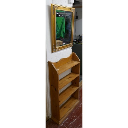 321 - Pine book shelf together with a gilt frame mirror