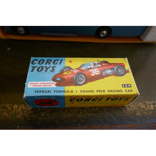 254 - Boxed Corgi Toys Major Ecurie Ecosse racing car transporter and 3 racing cars