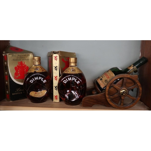 134 - 2 vintage bottles of Dimple whisky in original boxes (levels good) together with Corvorsier brandy m... 