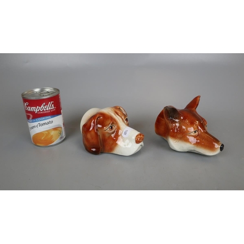 136 - Pair of fox and hound stirrup cups