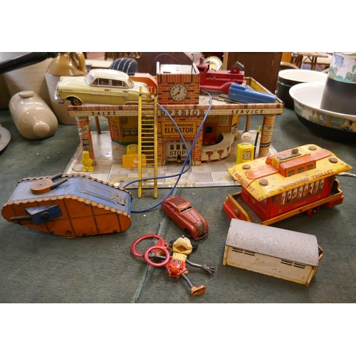 241 - Collection of mostly tin plate toys to include garage