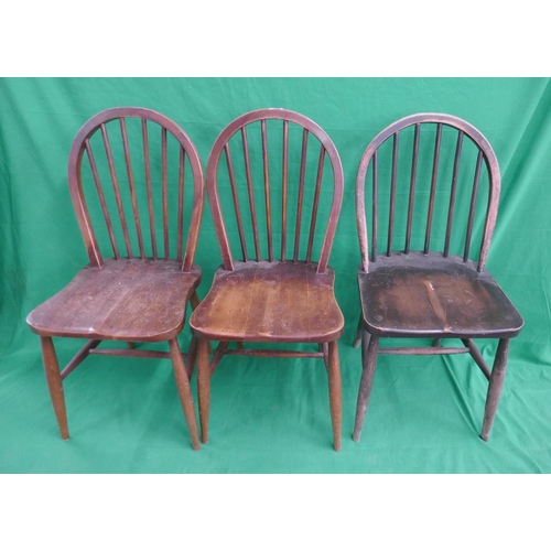 244 - Pair of Ercol stick-back dining chairs together with another