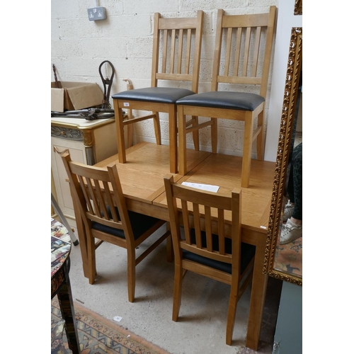 399 - Oak table and 4 chairs