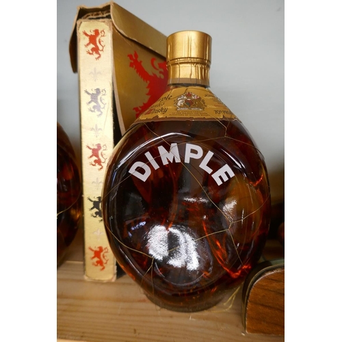 134 - 2 vintage bottles of Dimple whisky in original boxes (levels good) together with Corvorsier brandy m... 