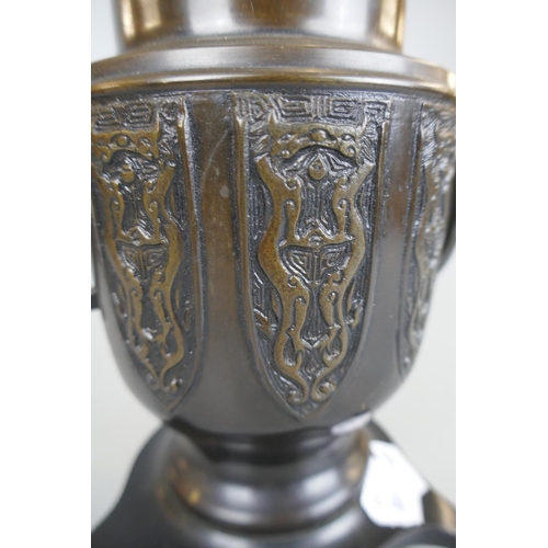 138 - Bronze urn