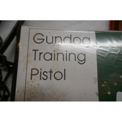 145 - 2 gin traps with gun dog training pistol and gun padlocks