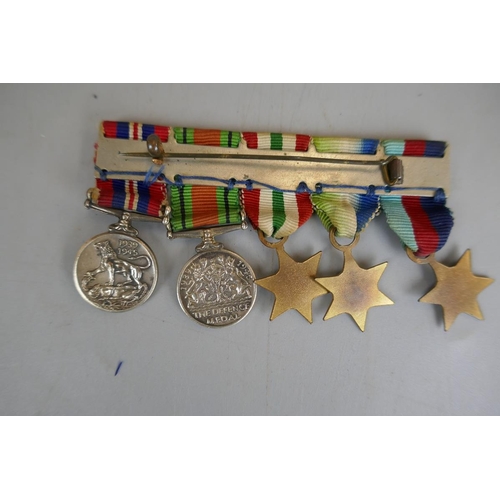 203 - 5 WWII medals together with minature bar