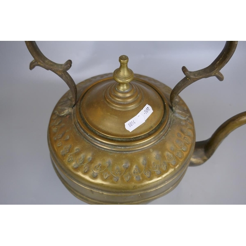 212 - Large brass kettle together with a copper kettle