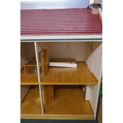 233 - Large Dolls house with furniture