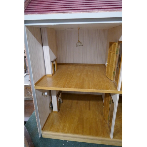 233 - Large Dolls house with furniture