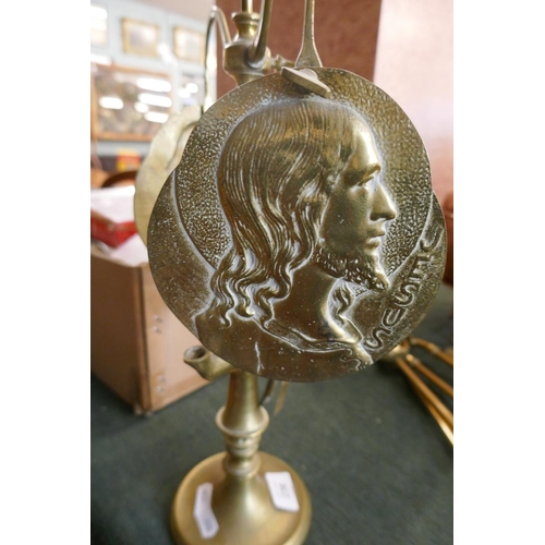 236 - Brass oil lamp depicting Jesus