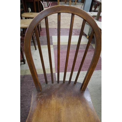 244 - Pair of Ercol stick-back dining chairs together with another