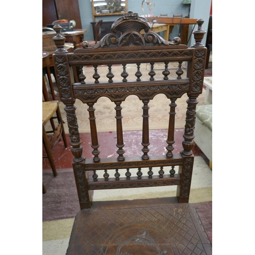 250 - Old carved oak chair