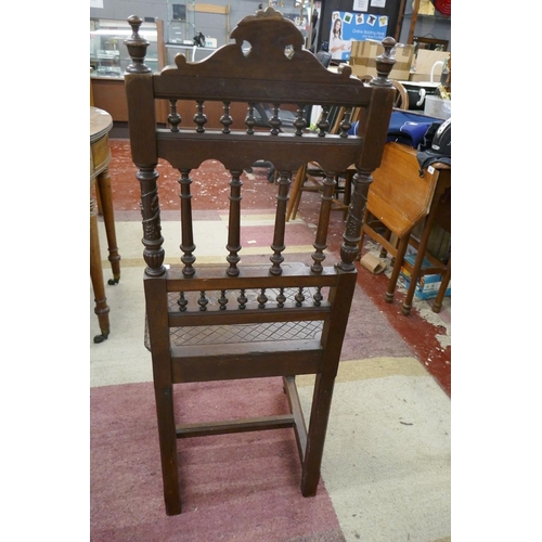 250 - Old carved oak chair