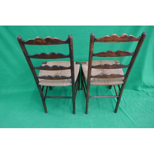 252 - Pair of ladder-back rush seated chairs