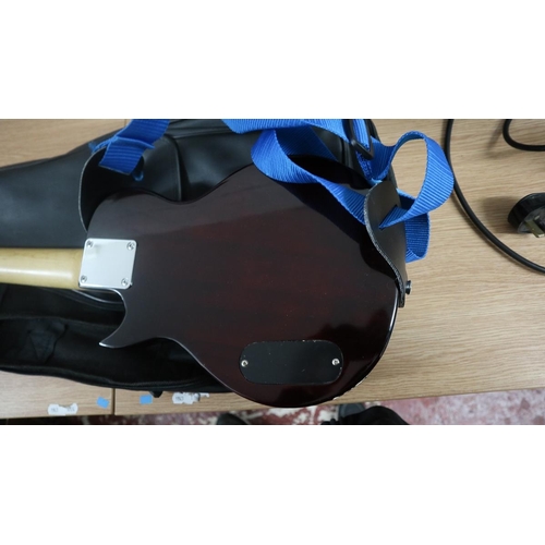 437 - Small electric guitar together with an Acoustic Solutions amplifier