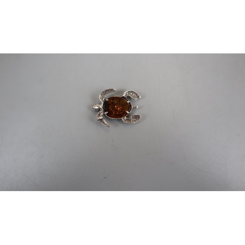 44 - Silver and amber turtle pendant