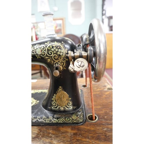 364 - Singer Sewing machine on stand