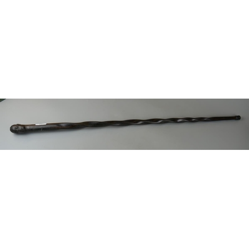 201 - Ebonised carved walking cane