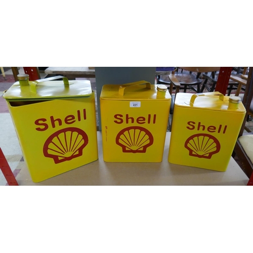 221 - 3 graduated metal storage boxes in the form of Shell oil cans