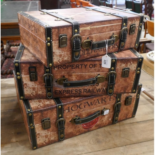 228 - 3 graduated Hogwarts suitcases