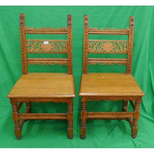 248 - Pair of carved oak chairs