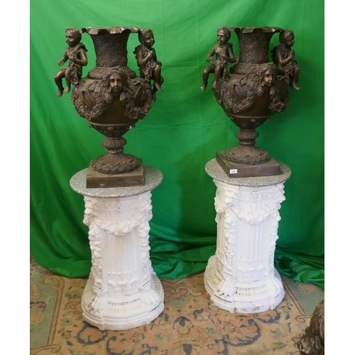 Impressive pair of large bronze urns on cast iron bases - Approx height: 153cm