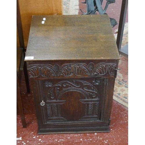 338 - Carved oak cabinet with its lock and key