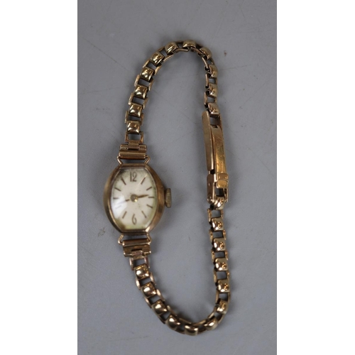 67 - Gold ladies watch with gold strap