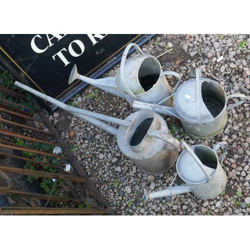 419 - 4 galvanised watering cans