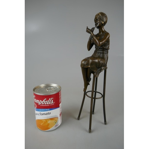 131 - Bronze figure of lady on stool - Approx height: 27cm