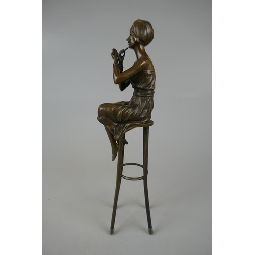 131 - Bronze figure of lady on stool - Approx height: 27cm