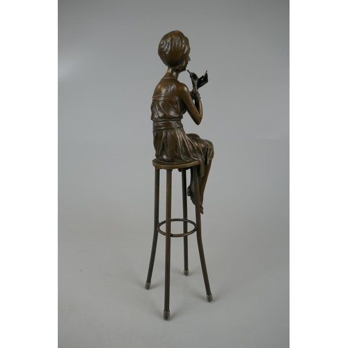 131 - Bronze figure of lady on stool - Approx height: 27cm