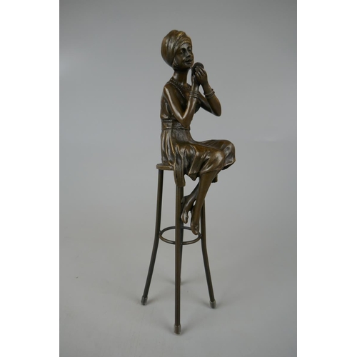 131 - Bronze figure of lady on stool - Approx height: 27cm