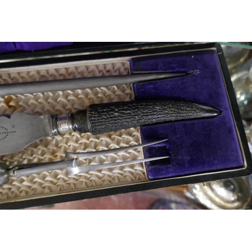 167 - Cased carving set with horn handles and silver collars