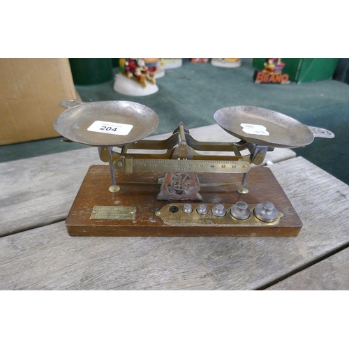 204 - Set of antique Eastman Kodak studio balance scales together with one-off Oyez antique embossing mach... 