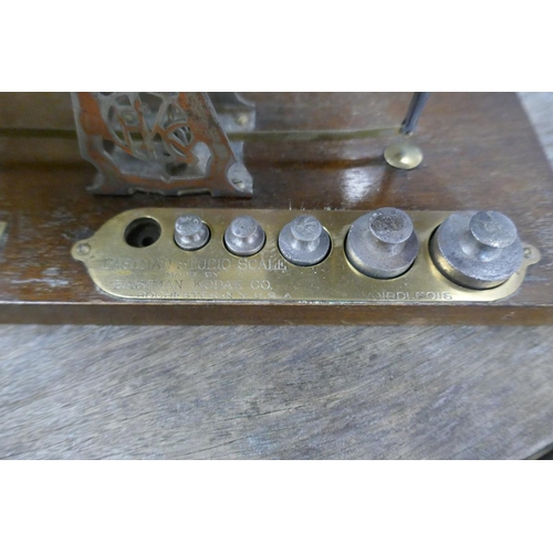 204 - Set of antique Eastman Kodak studio balance scales together with one-off Oyez antique embossing mach... 