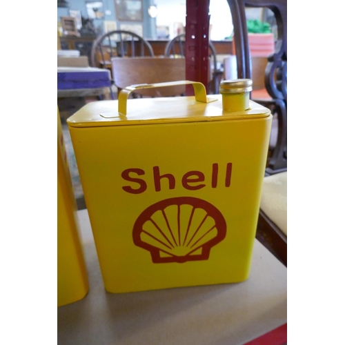 221 - 3 graduated metal storage boxes in the form of Shell oil cans