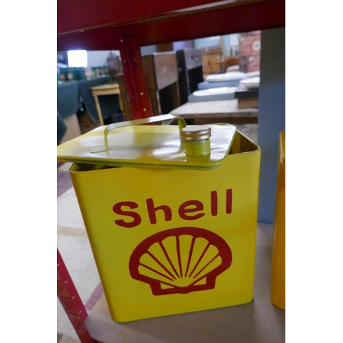 221 - 3 graduated metal storage boxes in the form of Shell oil cans