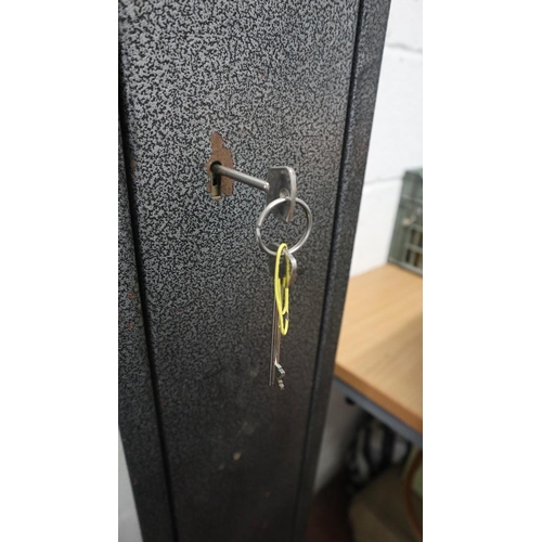 292 - Gun safe with key (holds about three rifles)