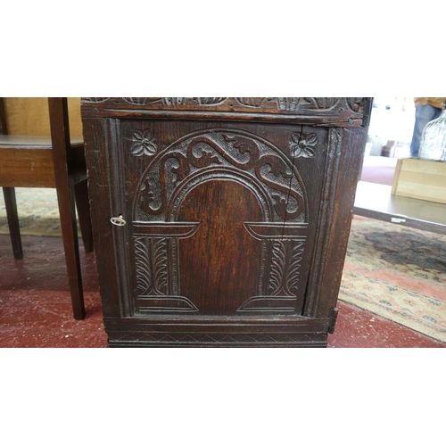 338 - Carved oak cabinet with its lock and key