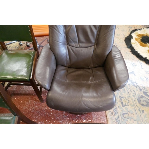 391 - Stressless style brown leather reclining swivel armchair together with matching foot stool