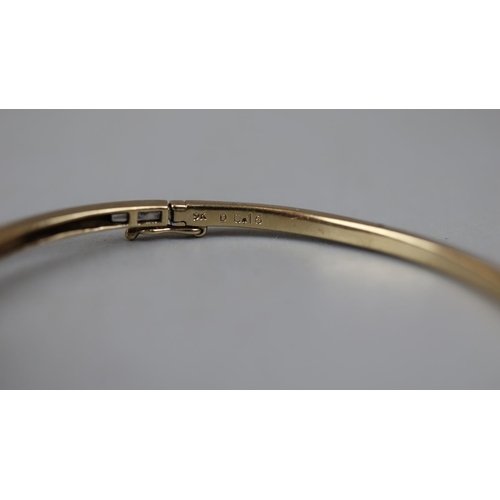 45 - Gold and diamond bangle