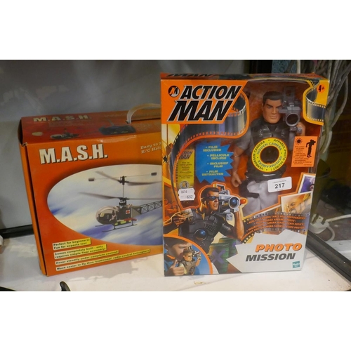 217 - Mash radio controlled helicopter together with an Action Man photo mission still in box